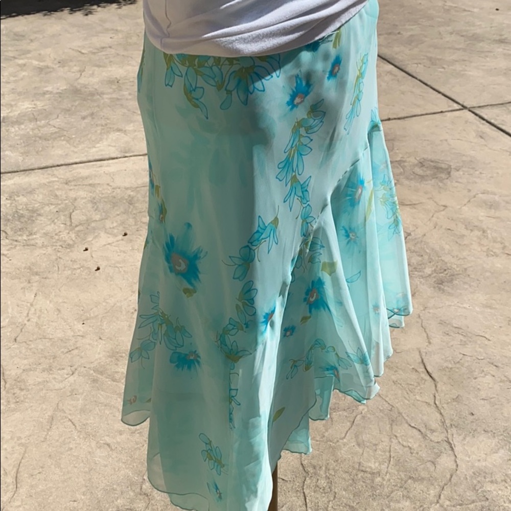 Sheer teal floral skirt .